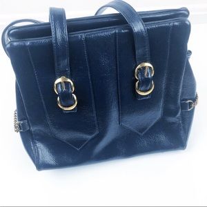Vintage 60s purse with gold chain and buckle detail.